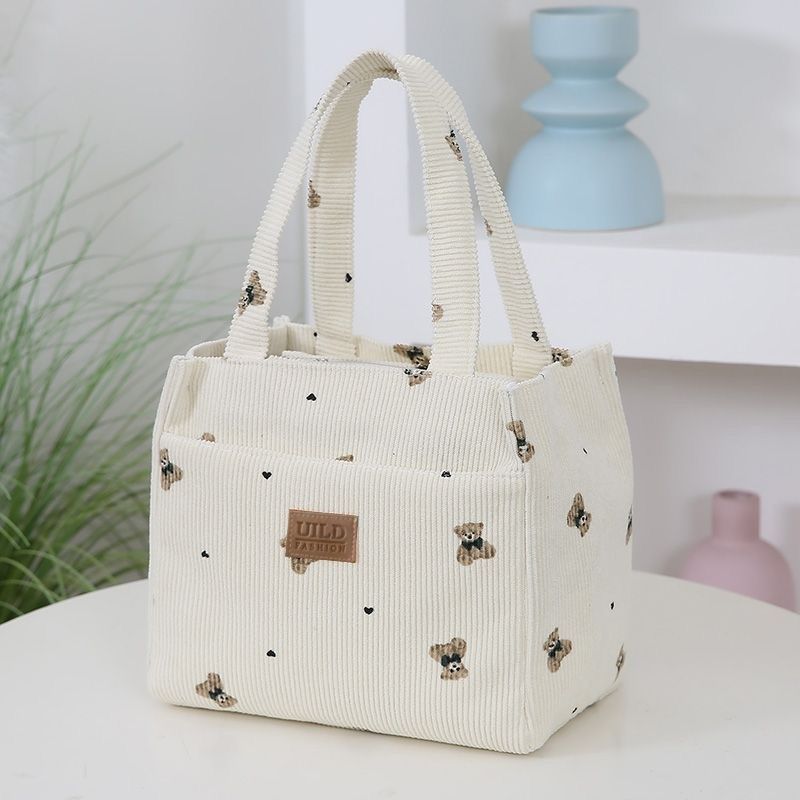 The new and simple corduroy bear handbag is perfect for daily commuting to work. It is a casual and portable handbag with a high level of appearance Specification drawing