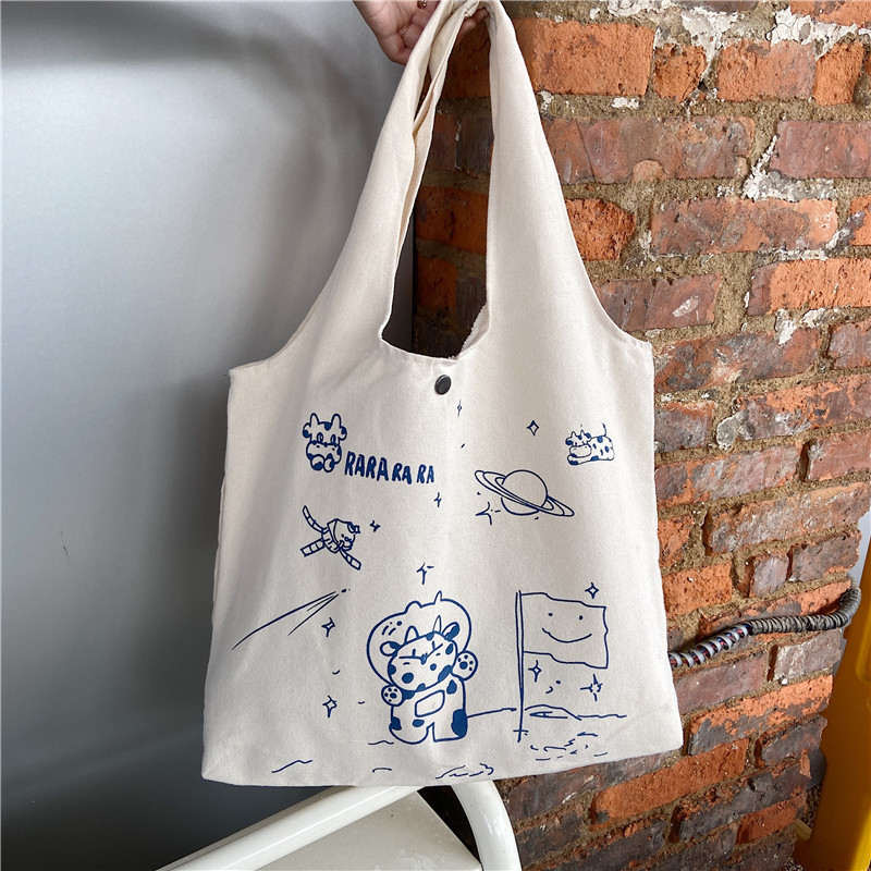 【 In Stock 】13173 Cute Moon Landing Cow single-shoulder Bag, student girls' schoolbag, canvas bag, large capacity wholesale Item Picture