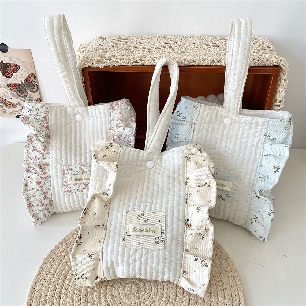 53183 Korean version Instagram new fresh and delicate floral handbag, women's shopping snack wrist bag, quilted hand-held bag full figure