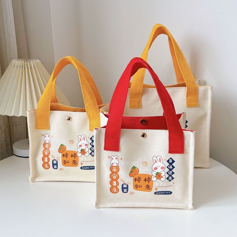 New canvas bag, Shishi Ruyi handbag, small square bag, fashionable, casual and cute bento bag, handbag, hand-held bag full figure