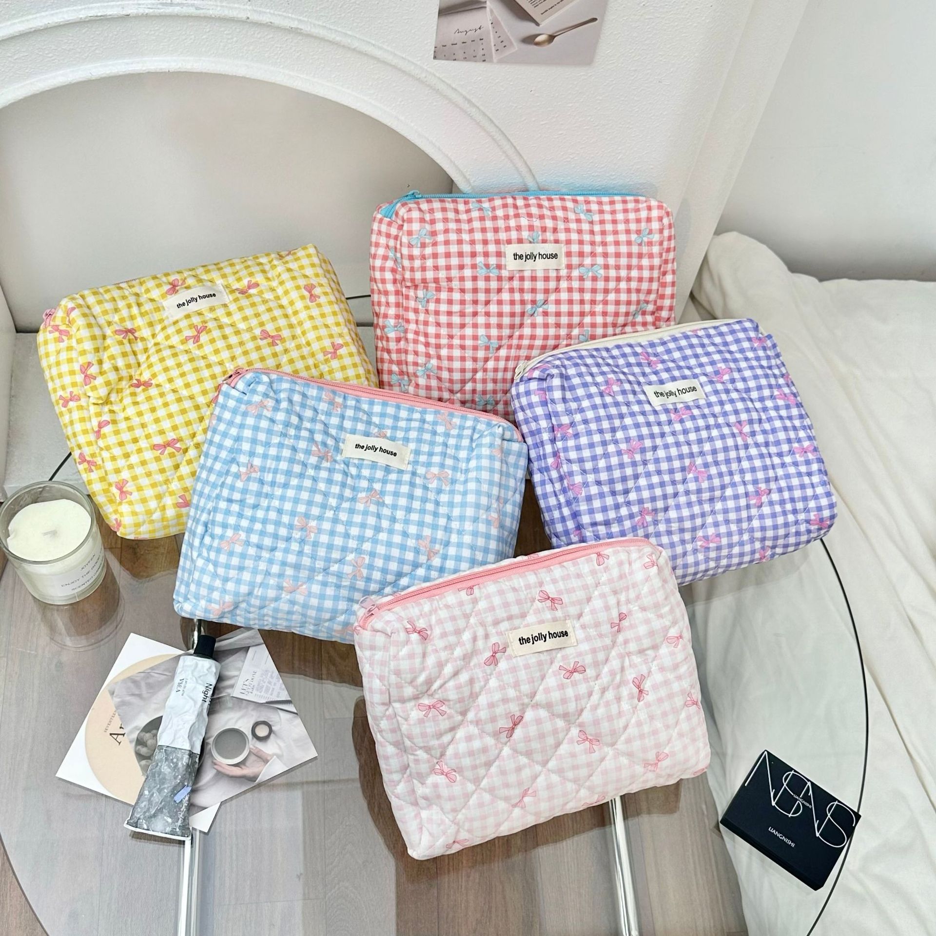 ins checkered bow makeup bag for women, large-capacity portable travel skincare storage bag, toiletry bag details Picture