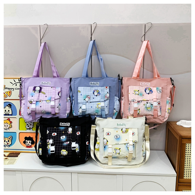A new Korean-style student crossbody bag with high appearance standards, a fresh and casual single-shoulder bag, and a cartoonish and cute hand-held tutorial bag for girls full figure