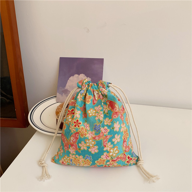 01123 Cotton and linen drawstring drawstring bags for home and travel, cosmetic organization bags, storage bags, key dust-proof bags wholesale Application Scenario