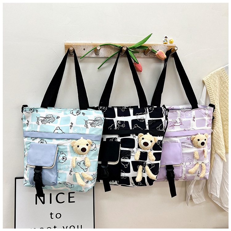Cute large-capacity tutorial bag for girls, new simple nylon hand-held tutorial bag for junior high school and primary school students, crossbody bag wholesale details Picture