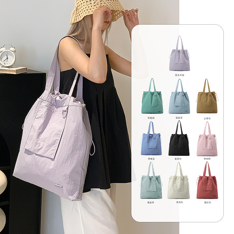 New lightweight, large-capacity, versatile, casual and laid-back Korean-style solid-color women's bag, nylon fabric single-shoulder underarm tote bag Application Scenario