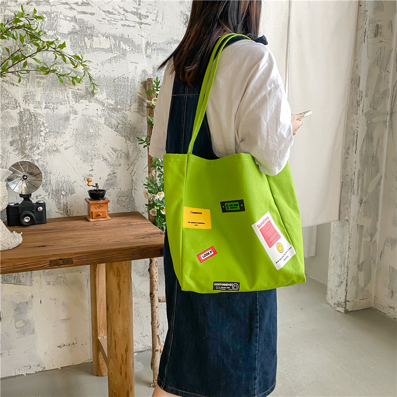 Korean style ins letter-printed open-top thin shoulder strap large-capacity canvas bag, simple and casual single-shoulder bag and schoolbag for women Specification drawing