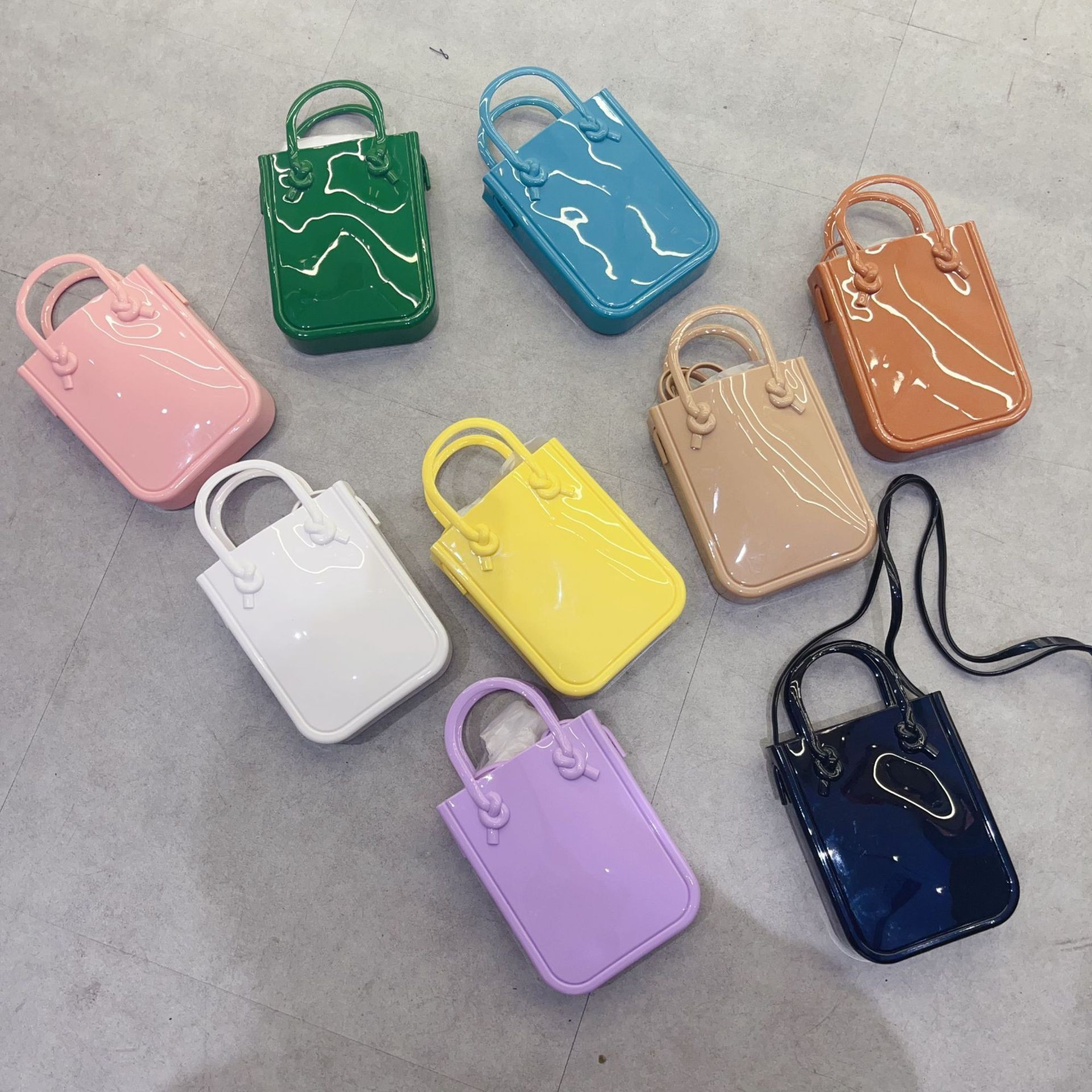 2025 New PVC mobile phone bag, jelly bag, hand-held small bag, candy, fashionable and trendy casual shopping bag, ladies' bag full figure