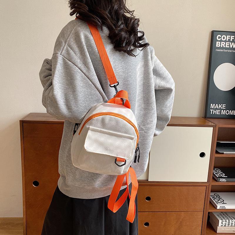 Korean-style casual, simple and retro solid-color Japanese-style canvas backpacks for women, student schoolbags, and a trend of women's commuting small backpacks details Picture
