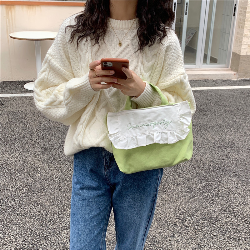 1441 Japanese and Korean chic Sweet ruffled bento Bag, Fresh embroidered hand-held small cloth bag, girl student bag wholesale details Picture