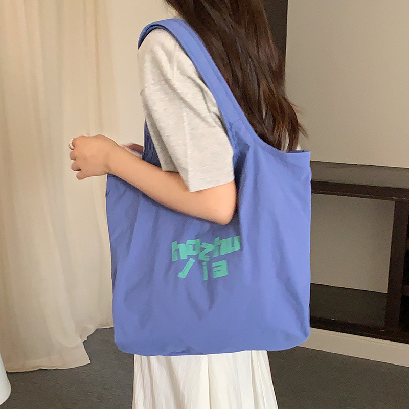 Canvas bag, a niche and artistic Instagram large-capacity single-shoulder bag, a high-end and versatile handbag for female students, suitable for commuting and class details Picture