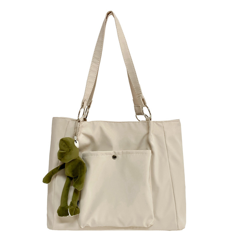 The 2022 new trendy, simple and casual single-shoulder bag and handbag for women, as well as the tote bag for students' classes Item Picture