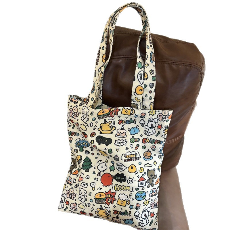 Cute cartoon 2025 new single-shoulder canvas bag, large capacity cloth bag, student tote storage, makeup bag, portable bag Item Picture