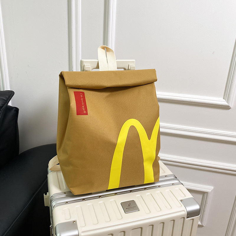 The new popular bags are McDonald's large-capacity backpacks, casual backpacks, hamburger paper bags, and student class bags full figure