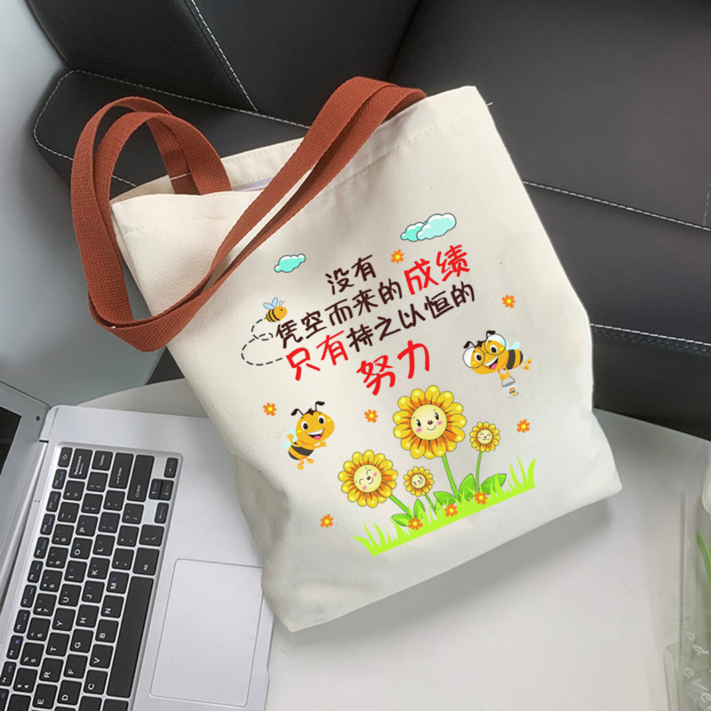 A new canvas bag for women, a single-shoulder bag for college students to attend classes, a versatile large-capacity bag for commuting, and a niche shoulder bag and handbag details Picture