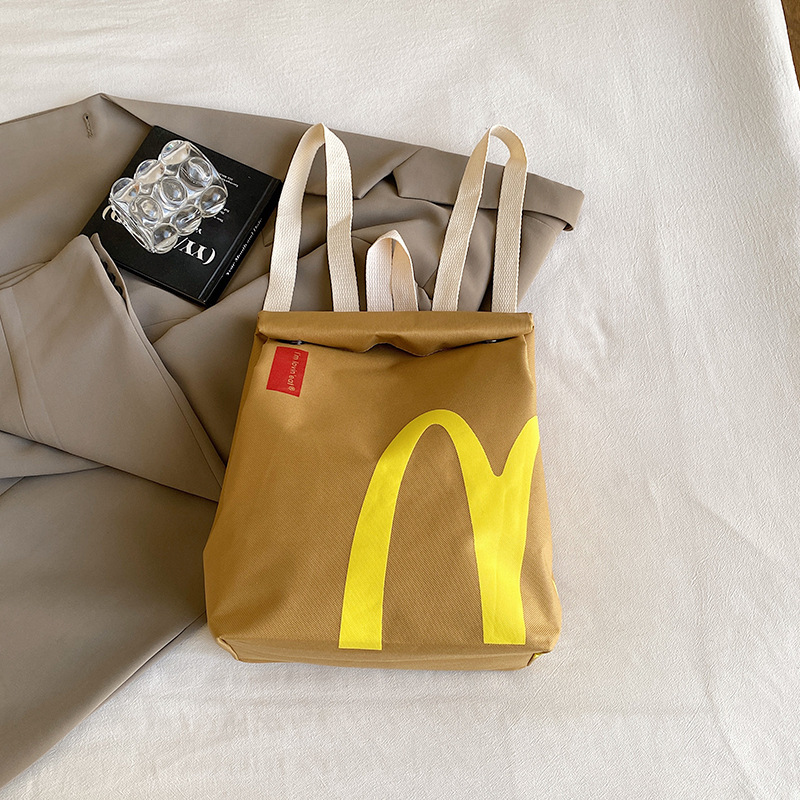 The new popular bags are McDonald's large-capacity backpacks, casual backpacks, hamburger paper bags, and student class bags details Picture