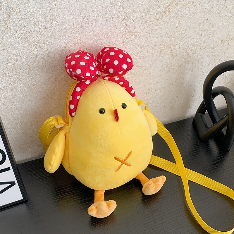 A small bag for mobile phones for women in autumn and winter 2021, a new and niche design crossbody bag with cartoon and cute doll mobile phone case full figure
