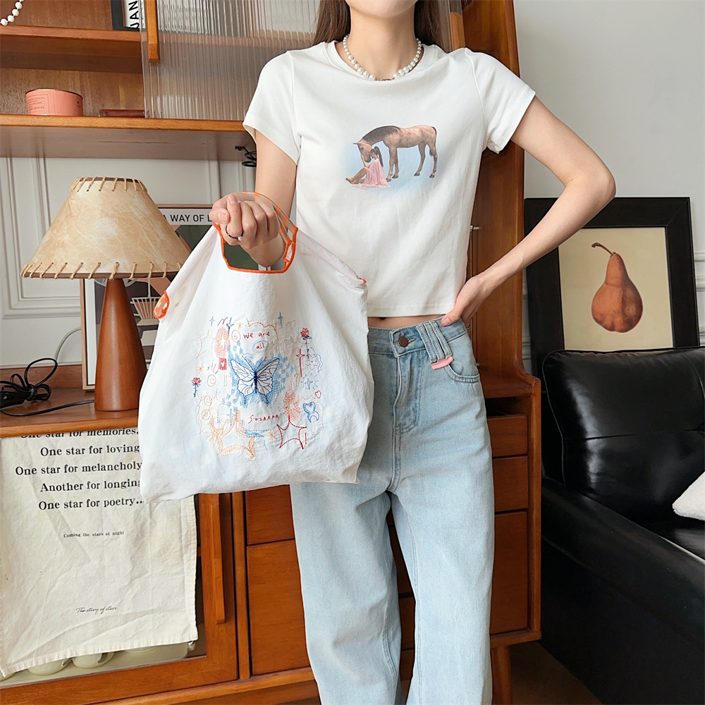 45301 Korean-style fresh and delicate embroidered hand-held Oxford bag, a sweet shopping bag for girls and a handbag for students in class full figure