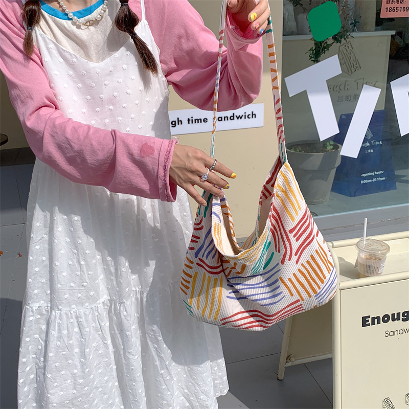 35201 New striped single-shoulder bag for work and commuting, crossbody bag, 2023 color-blocking large-capacity shopping bag for strolling details Picture