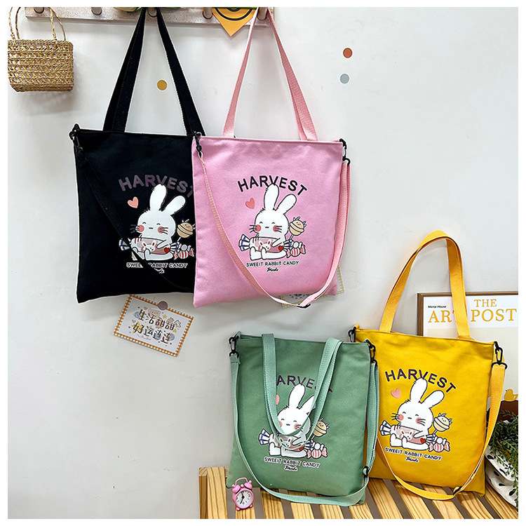 The new Korean-style artistic hand-held student schoolbag, simple and versatile single-shoulder canvas bag, and fashionable crossbody shopping bag are selling well full figure