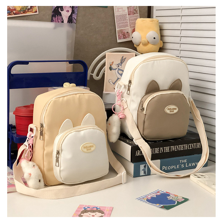 Summer cute little cat single-shoulder bag, double-sided new transparent pain bag, can hold 20cm cotton doll student backpack details Picture