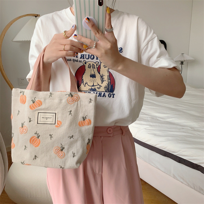 3482 Pumpkin embroidery pen case, stationery storage and organization bag, large-capacity hand-held bento bag, easy to carry hand in hand full figure