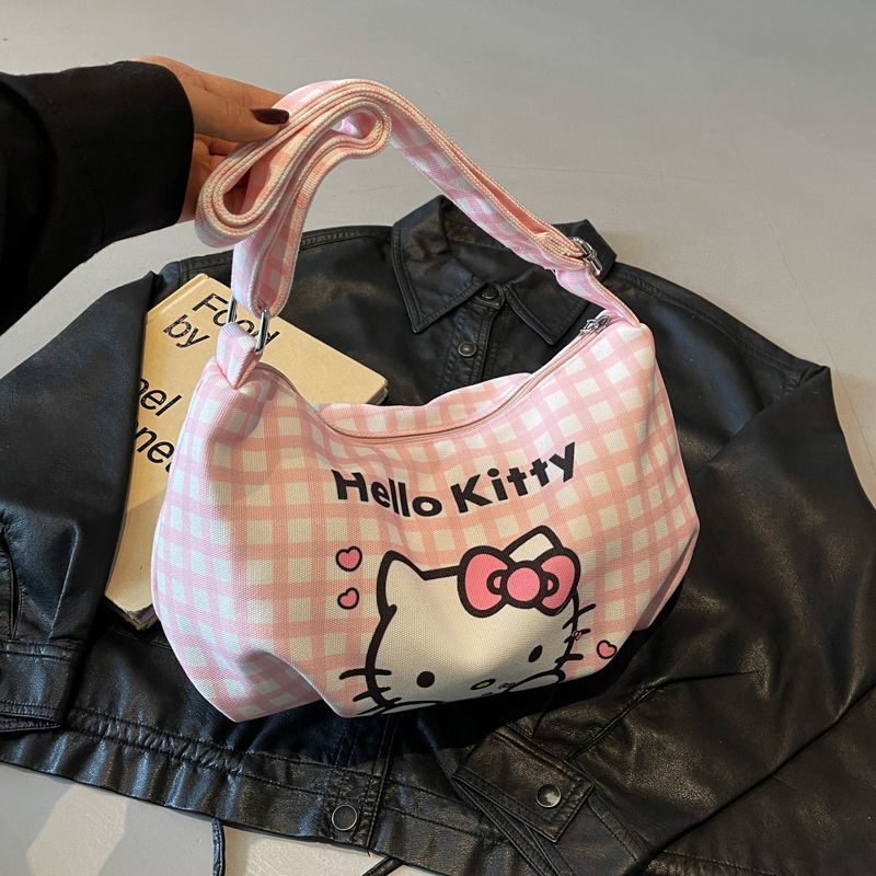 Cartoon Hello Kitty checkered canvas bag 2025 New style large-capacity lightweight single-shoulder crossbody bag for girls, children's bag full figure
