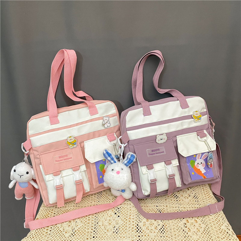 Children's canvas tutorial bag, hand-held bag, waterproof large capacity, double-shoulder tutorial bag, primary school students' single-shoulder crossbody bag details Picture