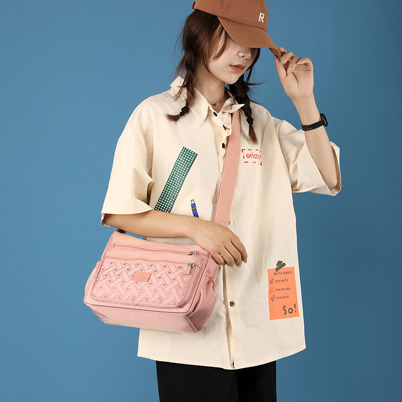 Ladies' crossbody bag, travel nylon fashionable embroidered single-shoulder bag, large capacity for women's travel, multi-layered simple, middle-aged mom Application Scenario