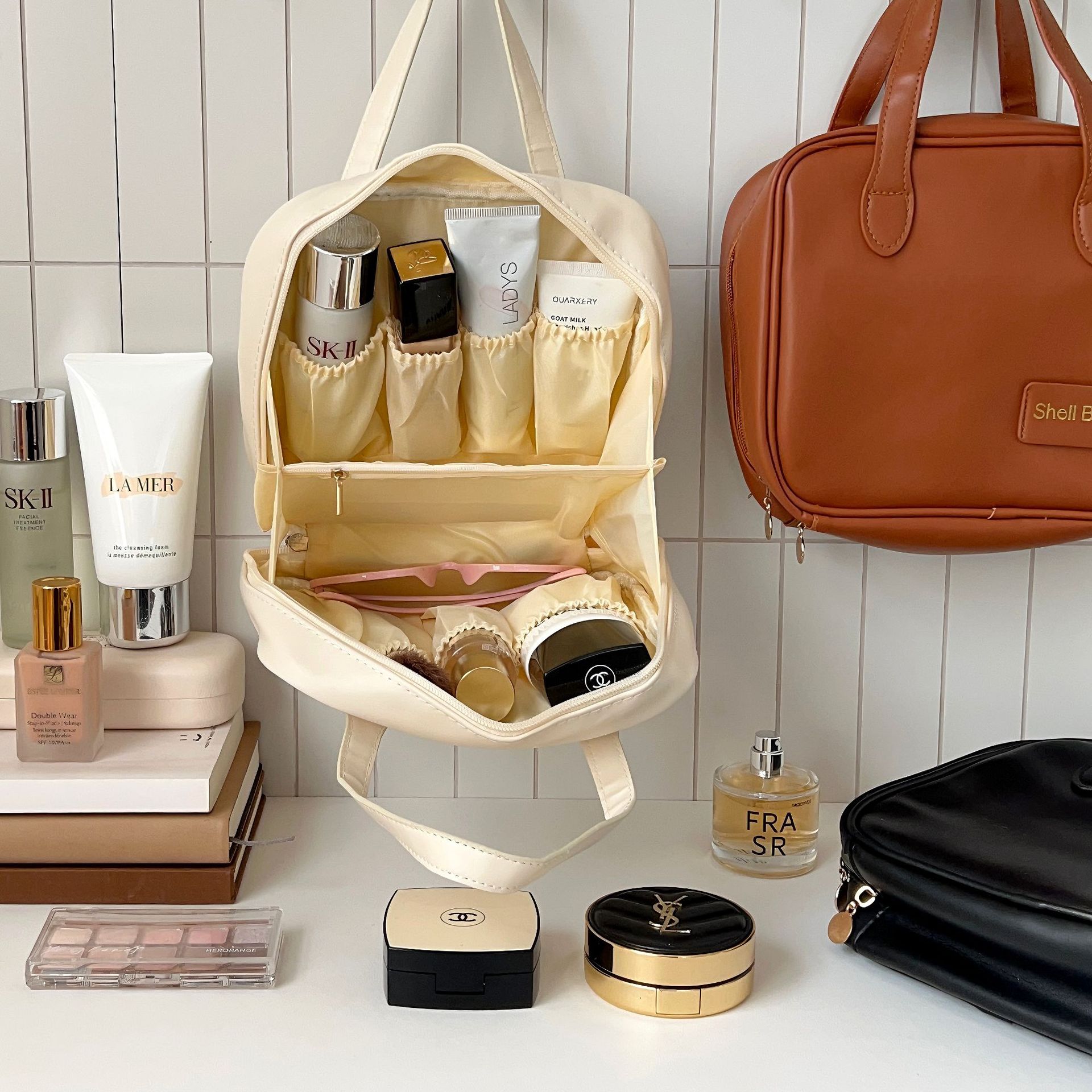 A high-end portable hand-held cosmetics storage bag with large capacity for women in 2024, and a travel toiletries bag with compartments Application Scenario