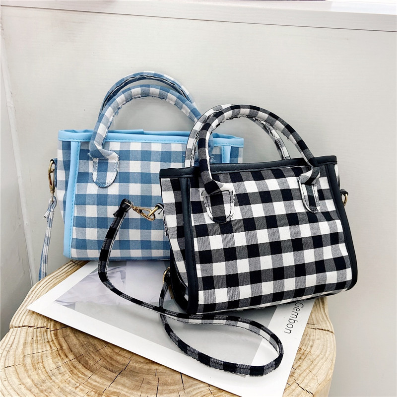 Retro checkered hand-held women's bag 2021 new Korean style, trendy, simple and stylish, women's fashionable single-shoulder bag and crossbody bag full figure