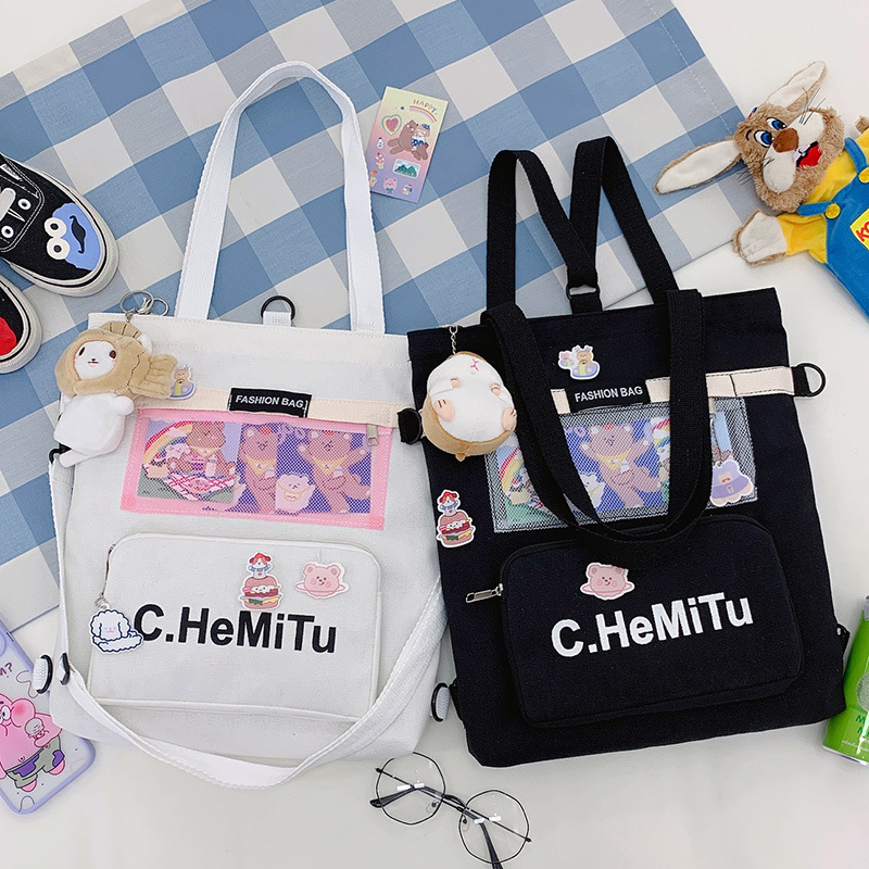 Korean-style canvas bag for girls with one shoulder, in the style of Harajuku, ulzzang, with a large capacity and contrasting colors, is a crossbody hand-held schoolbag for classes full figure