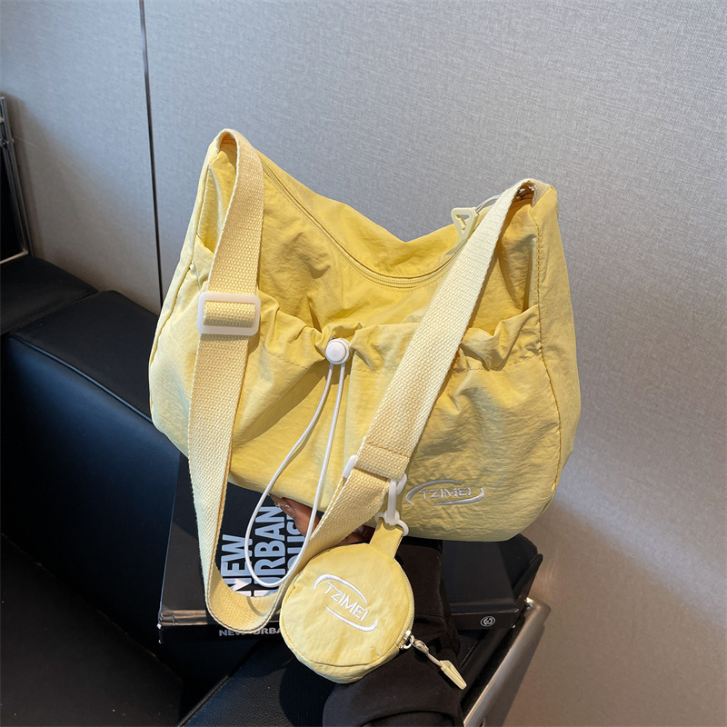 Large-capacity canvas bag for women, 2025 new summer niche single-shoulder crossbody bag, Korean-style pleated tote bag for class details Picture