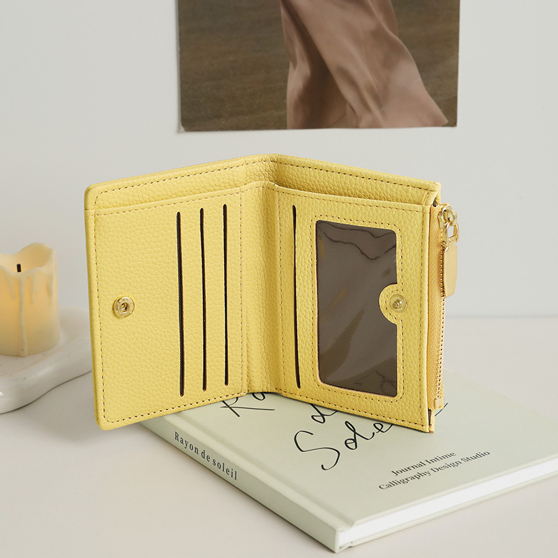 TAOMICMIC's new student two-discount short wallet is a niche and creative zipper ID card wholesale coin wallet Application Scenario