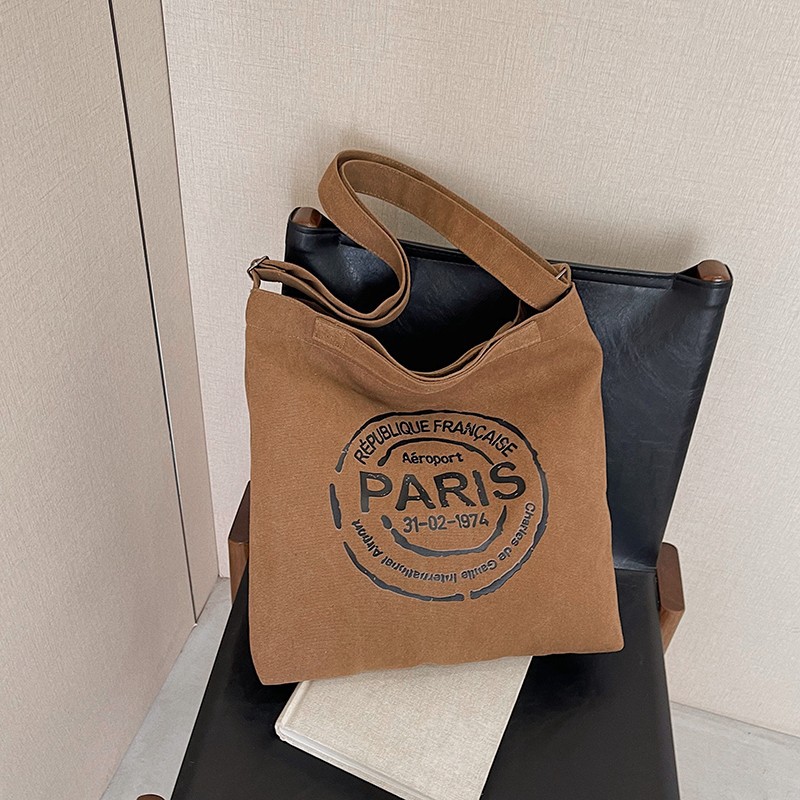 Cross-border students' hand-held canvas bag for class, fashionable lettered trendy tote bag, large-capacity commuting single-shoulder bag for women Application Scenario