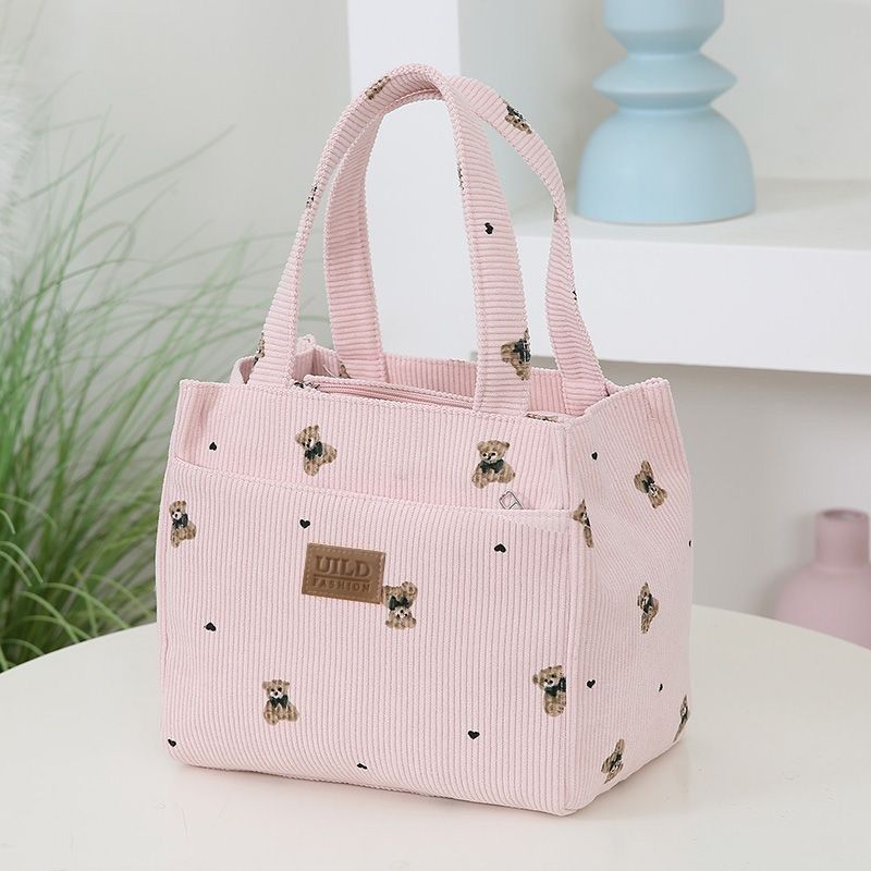 The new and simple corduroy bear handbag is perfect for daily commuting to work. It is a casual and portable handbag with a high level of appearance Application Scenario