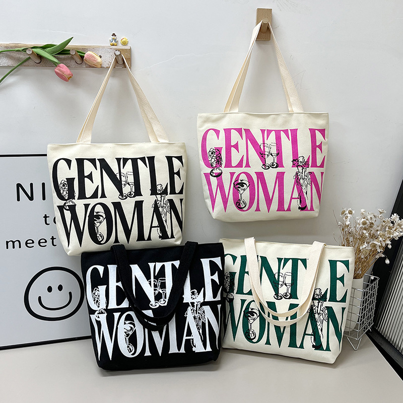 Gentlewoman's new large-capacity canvas bag, a single-shoulder shopping bag with letters, is a versatile student commuting tote bag full figure