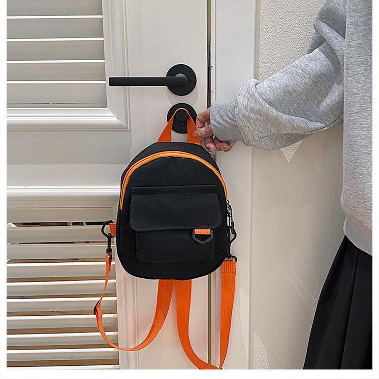 Korean-style casual, simple and retro solid-color Japanese-style canvas backpacks for women, student schoolbags, and a trend of women's commuting small backpacks undefined