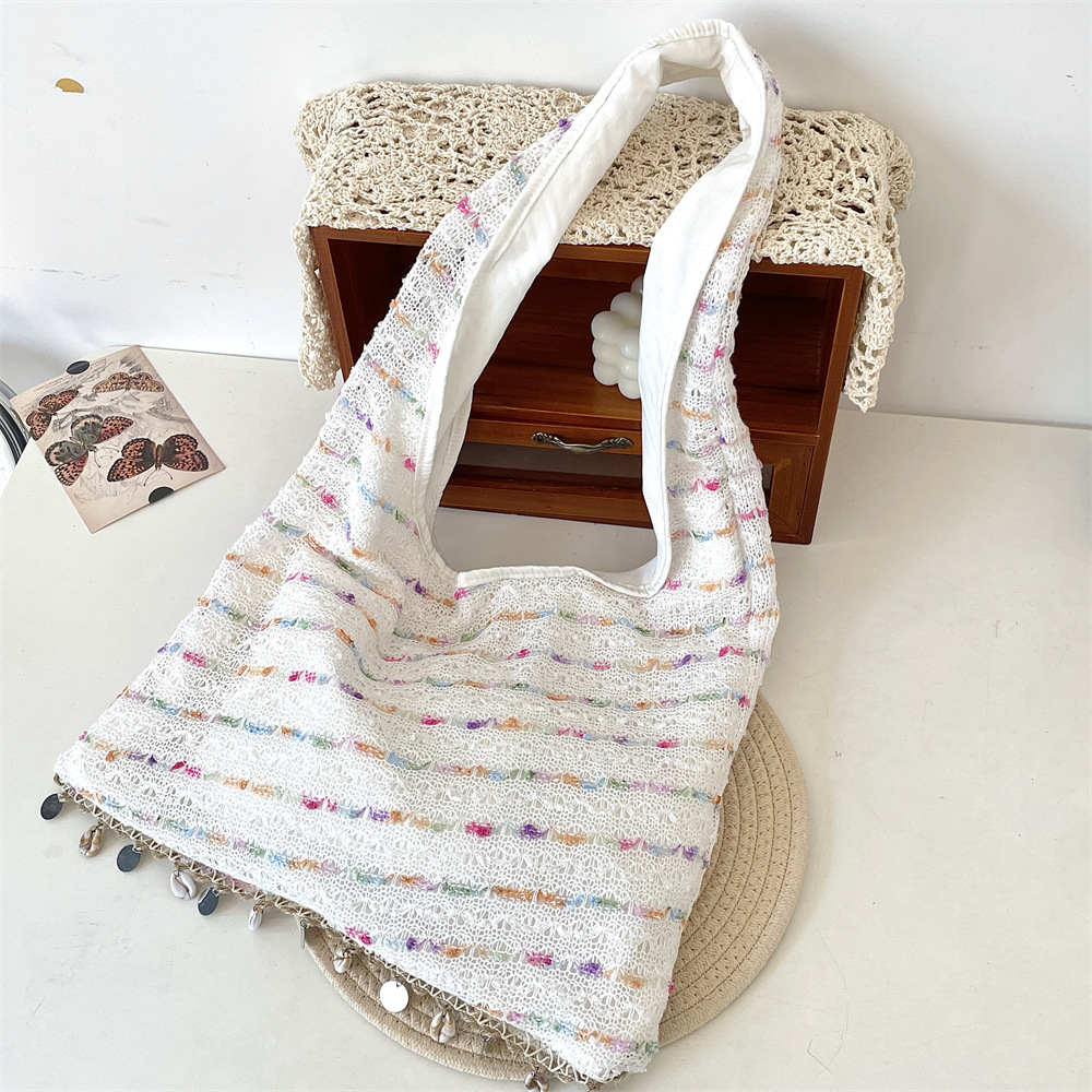 53203 Spring/Summer Gentle candy-colored knitted crossbody tote bag, shell buckle single-shoulder bag, large-capacity vest bag Application Scenario