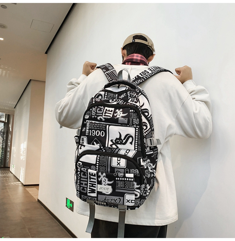 Large-capacity junior high school student schoolbag, travel backpack, niche printed new style, high school and college students go on trips details Picture