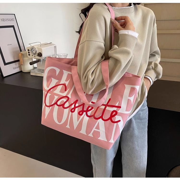Large-capacity letter-shaped tote bag for women, 2025 new niche single-shoulder canvas bag, versatile ins commuting and tutorial bag full figure