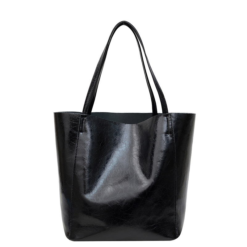 The large-capacity retro tote bag for women in 2024, a new style of fashionable, simple and casual large bag in solid color, versatile single-shoulder bag, is selling well Item Picture