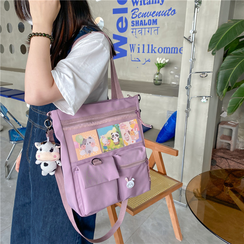 Large-capacity Japanese-style single-shoulder canvas bag for girls, versatile crossbody, ins, a tote bag for junior high school students' classes, and a schoolbag for after-school tutoring details Picture
