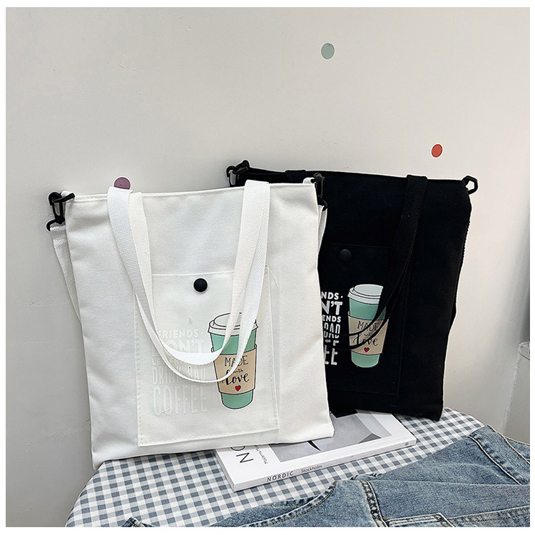The new Korean Haraju-style single-shoulder bag is a bestseller. It features a unique printed fashion handbag and a simple and casual canvas tutorial bag details Picture