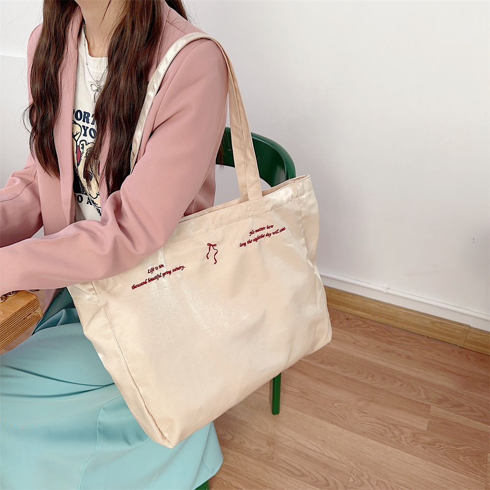 44284 large-capacity double-sided embroidered bow, sweet tote bag, single-shoulder cloth bag, canvas schoolbag for girls details Picture