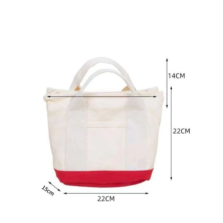 New canvas bag, summer little rabbit carrot handbag, cute hand-held bag, multi-pocket bag for moms going out Item Picture