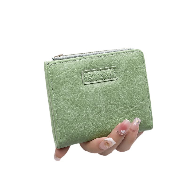 The new 2024 Korean student retro folding wallet with a forest-style buckle is a three-dimensional and portable wallet Item Picture