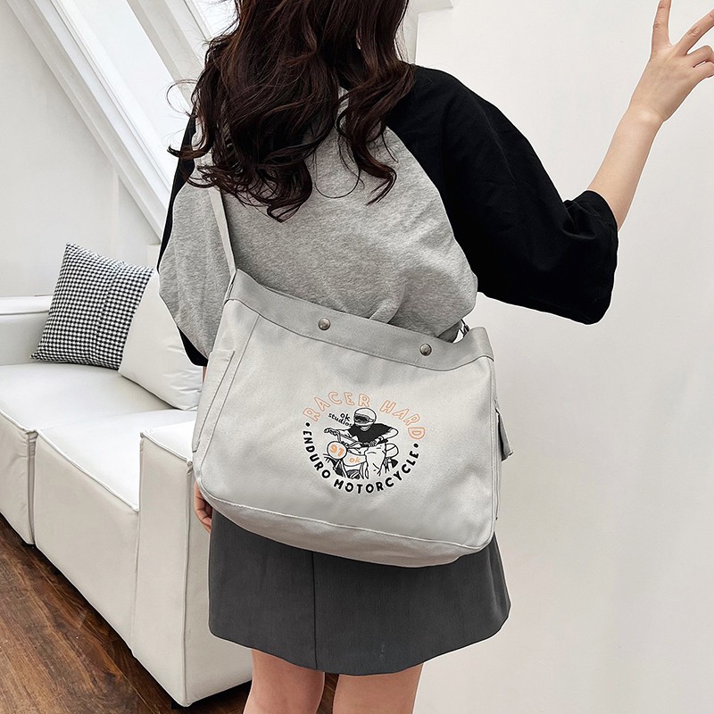 Wholesale large-capacity casual commuting women's single-shoulder bags, Korean-style trendy and fashionable handbags, LOGO printed canvas bags full figure