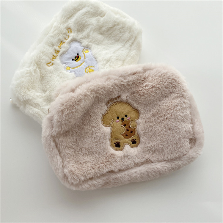 11094 Korean version of Instagram soft and cute plush makeup bag, cartoon embroidery storage coin purse, female student stationery pen case Application Scenario