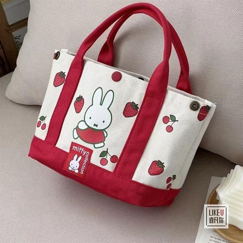 New cartoon rabbit embroidered thickened canvas tote bag with multiple pockets, portable single-shoulder bag for moms to carry when going out Application Scenario