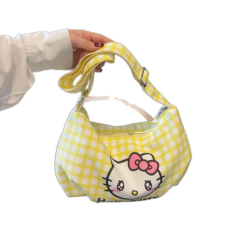 Cartoon Hello Kitty checkered canvas bag 2025 New style large-capacity lightweight single-shoulder crossbody bag for girls, children's bag Item Picture